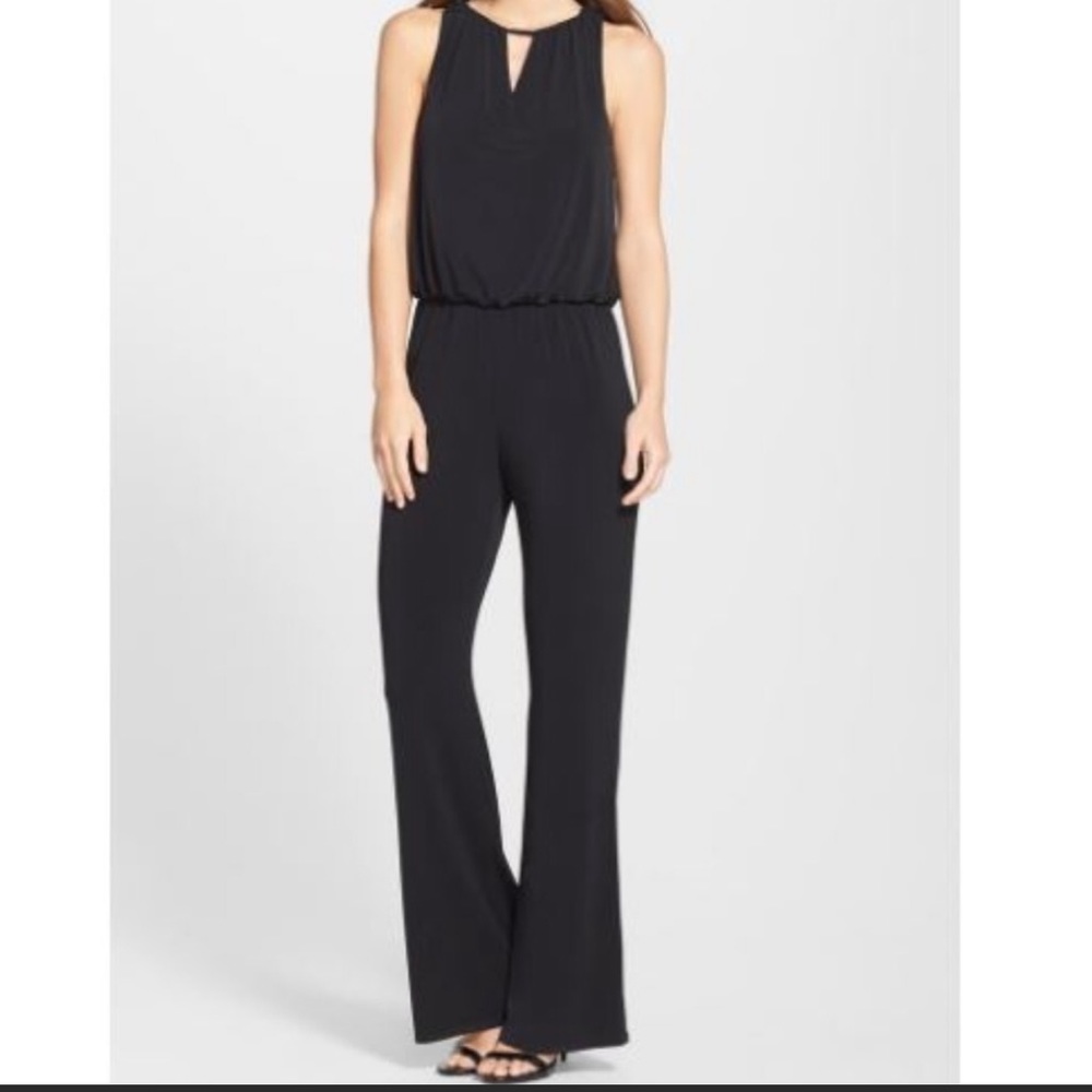 Sleeveless black jumpsuit with lace back
